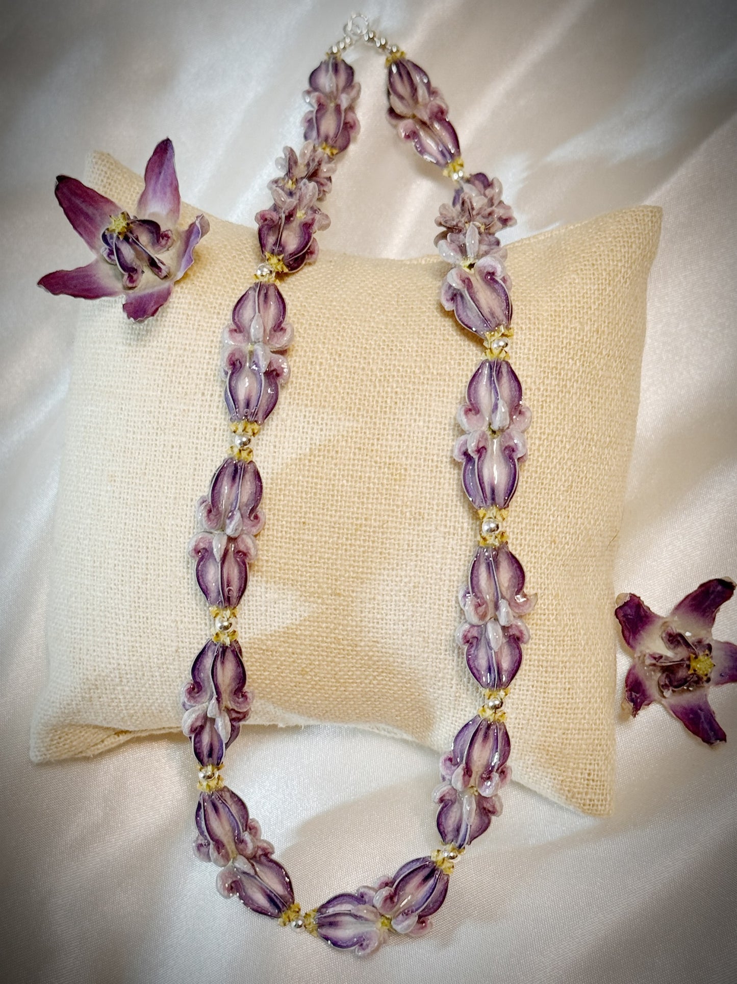 Pua Kalaunu purple double dangle lei with silver spacers and clasp