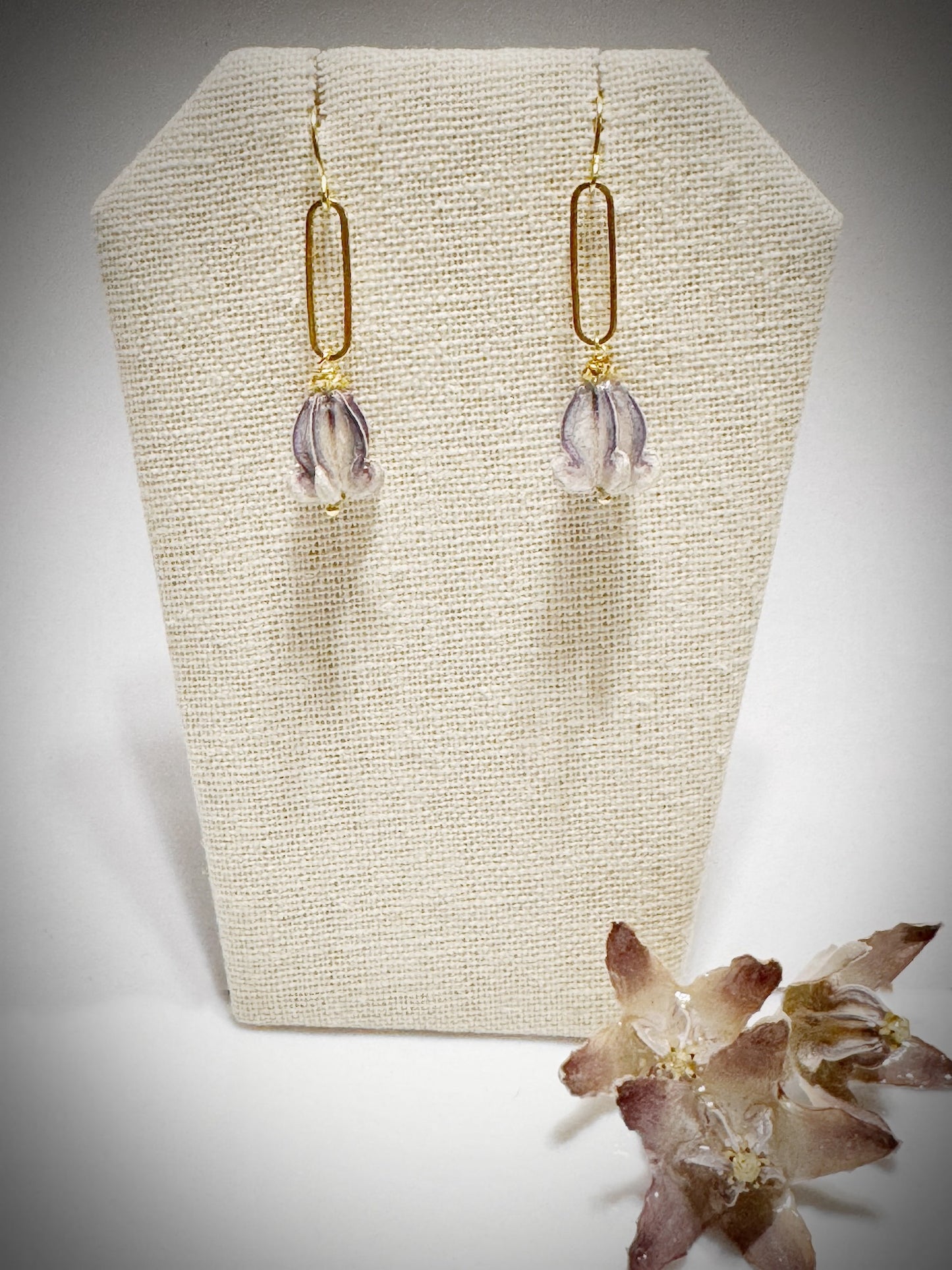 Pua Kalaunu purple paperclip dangle gold earrings