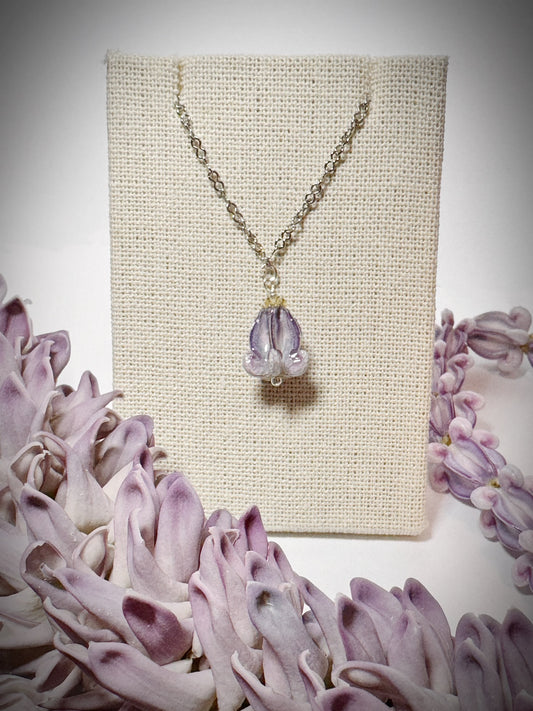 Pua Kalaunu purple dangle necklace on silver chain