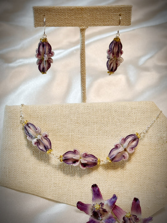 Pua Kalaunu double purple dangle necklace on silver chain and earring set with 3 clusters