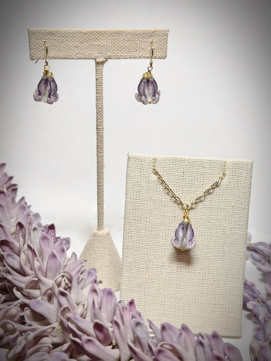 Pua Kalaunu purple dangle necklace on gold chain and earring set