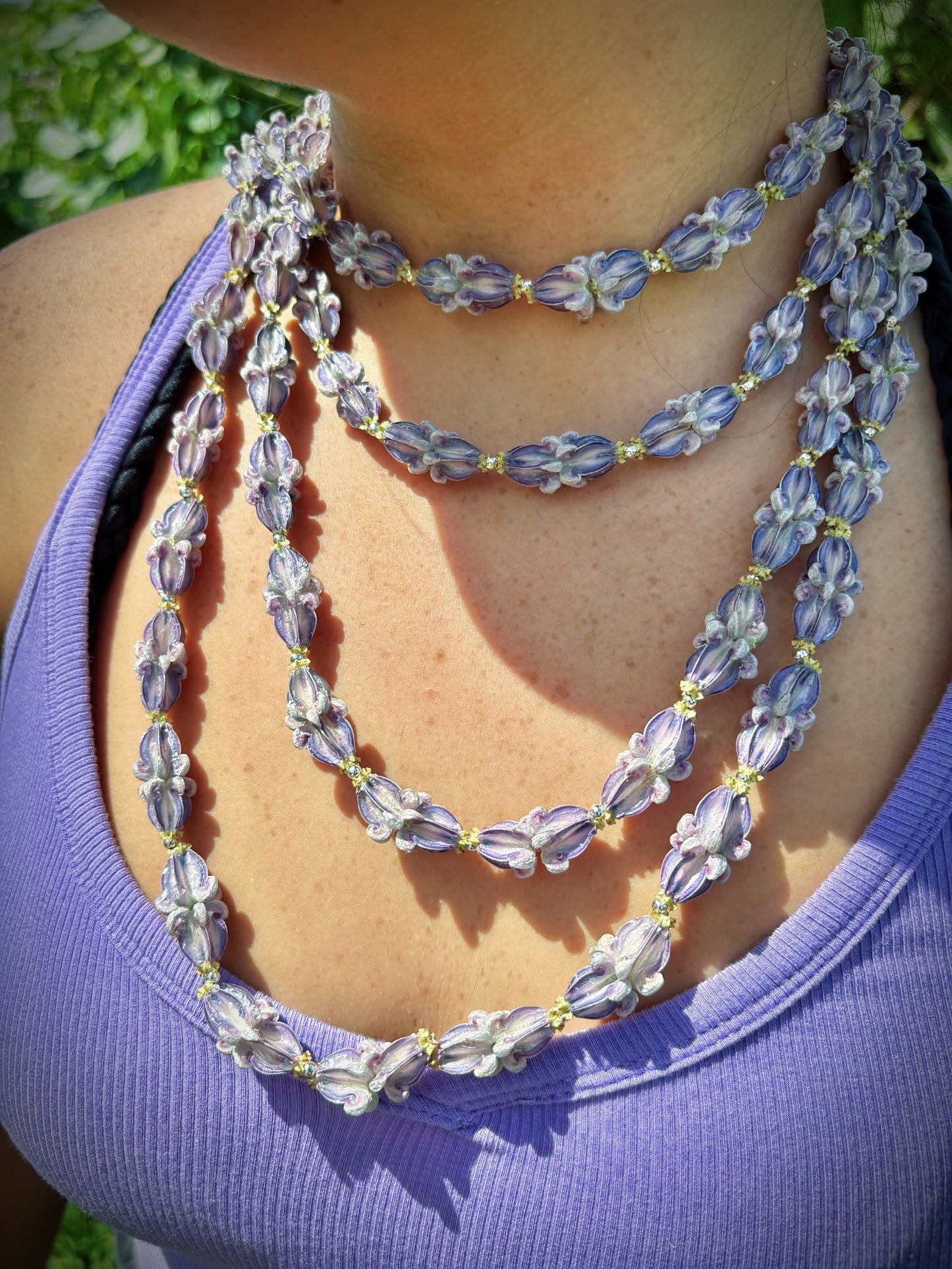 Pua Kalaunu purple extra long double dangle lei with silver spacers and clasp