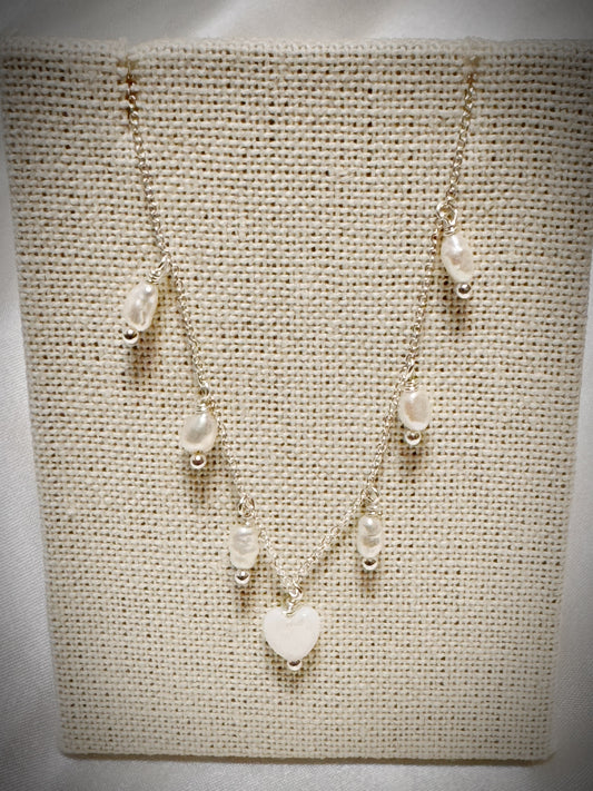 White freshwater pearls dangle necklace with white mother of pearl heart on silver chain 18”