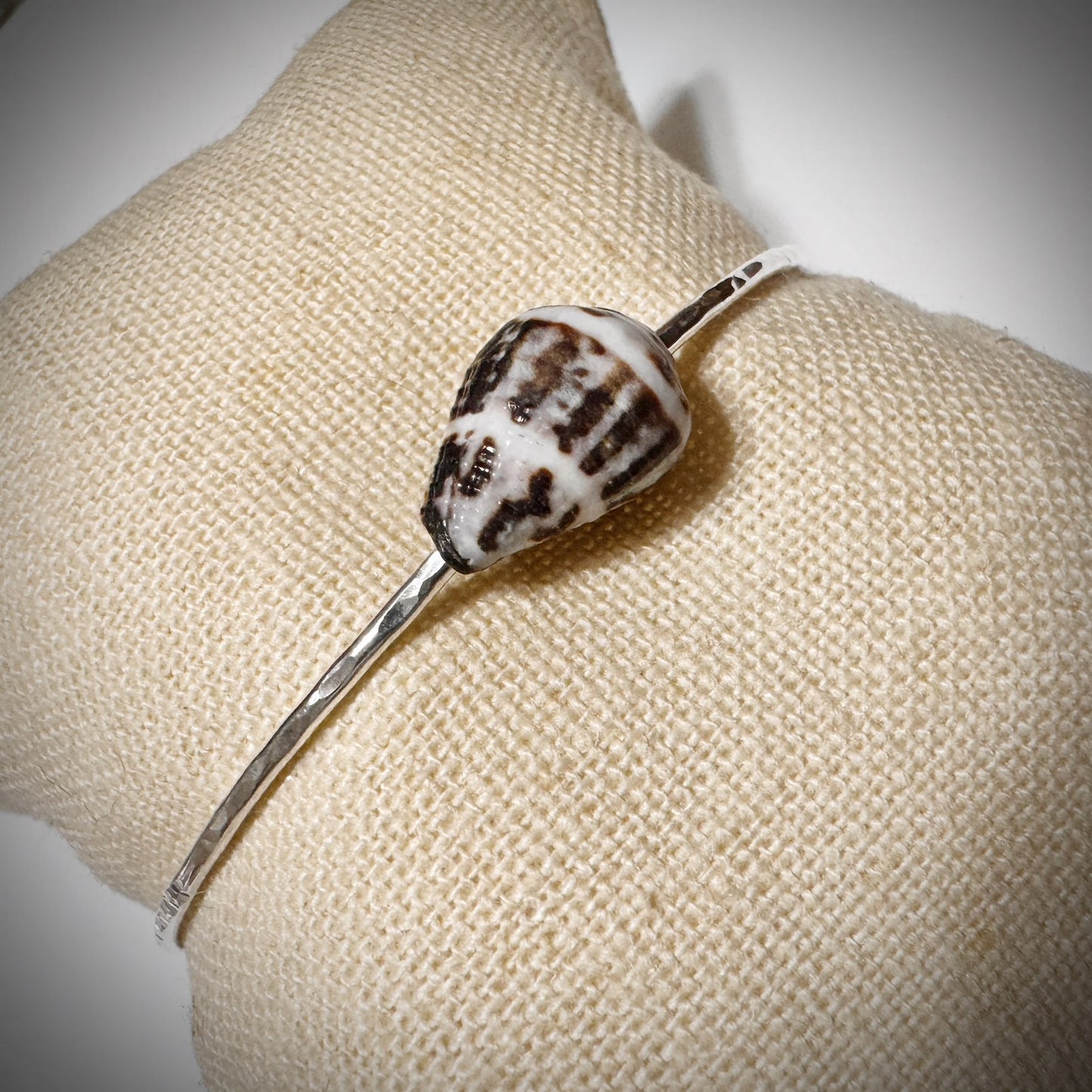 Blackish brown with white Cone seashell floating bangle