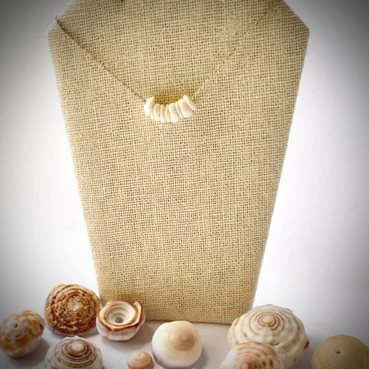 Extra small multiple Puka seashell floating necklace