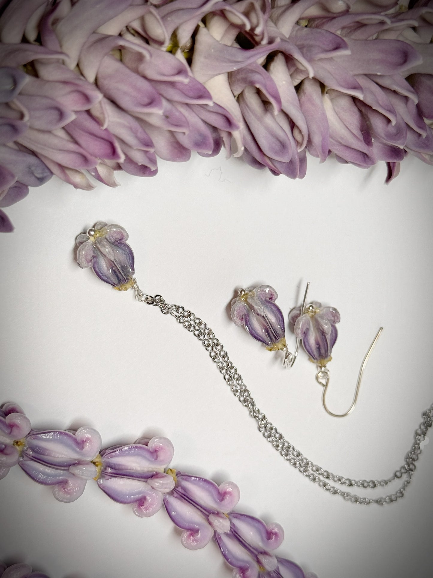 Pua Kalaunu purple dangle necklace on silver chain