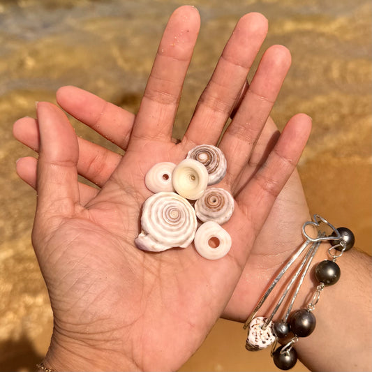 Small multiple Puka seashell floating necklace with white pearl