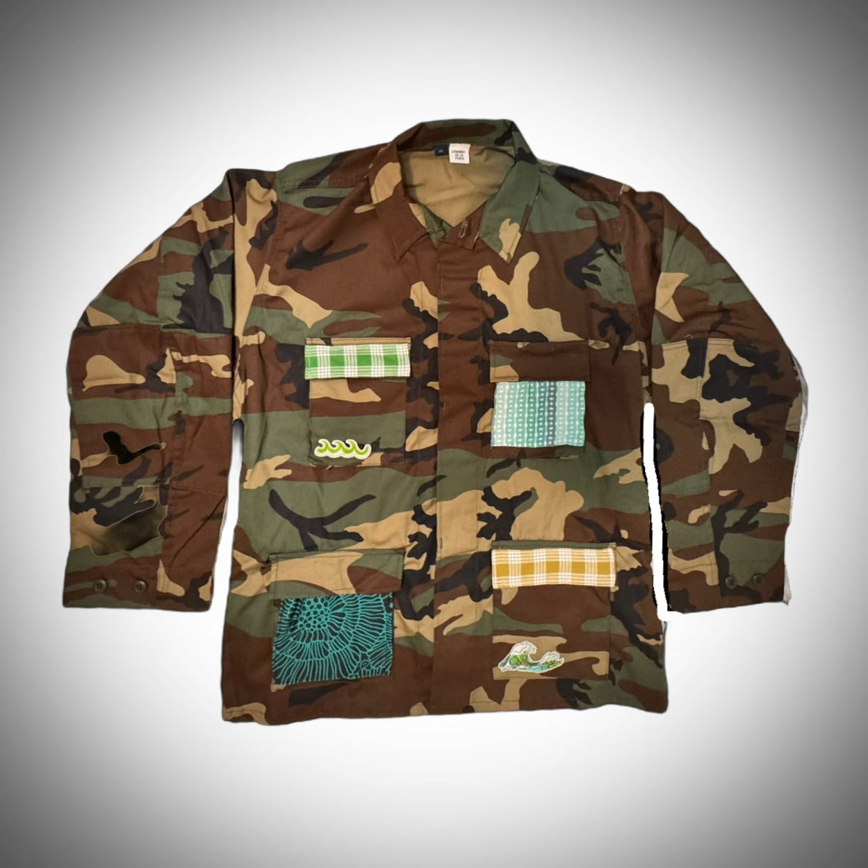 Vintage camouflage army jacket with local flare