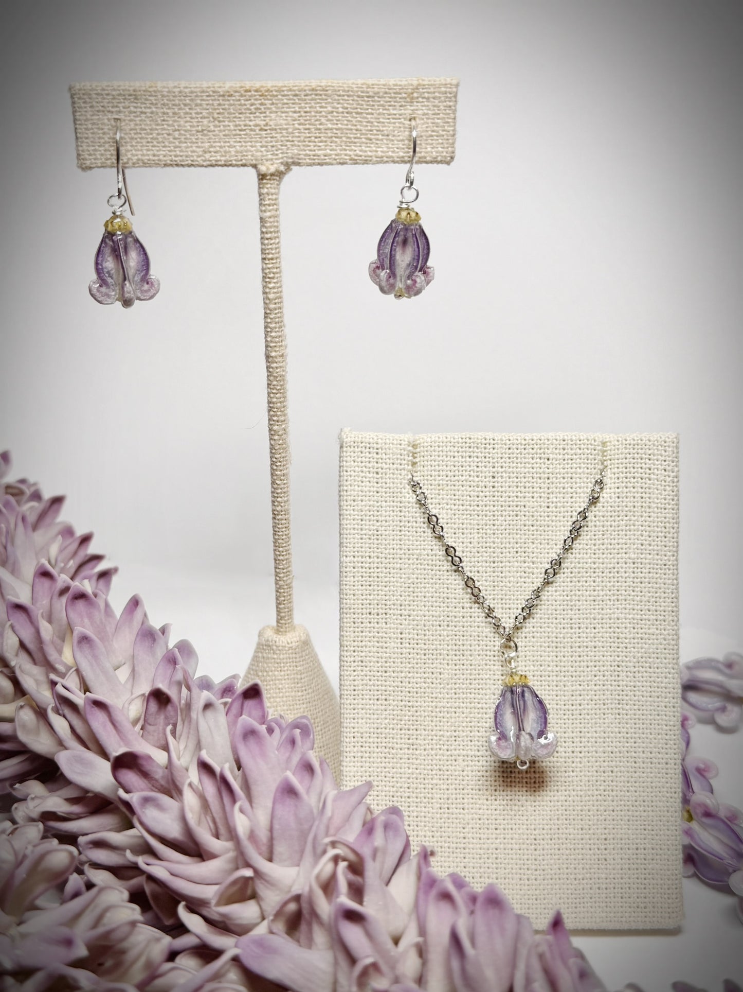 Pua Kalaunu purple dangle necklace on silver chain and earring set