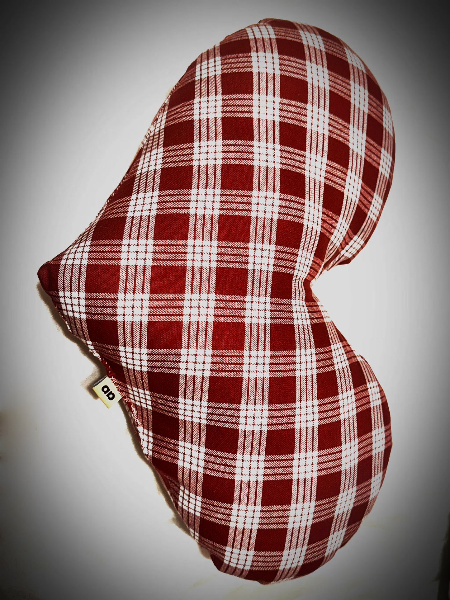 Brown Palaka uluna pu’uwai “heart pillow”