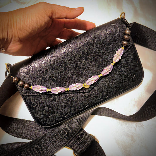 Pua Kalaunu purple eke lei with silver spacers large pearl finish and heart clasps