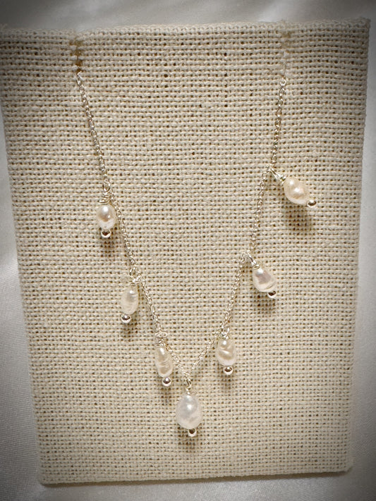 White freshwater pearls dangle necklace on silver chain 18”
