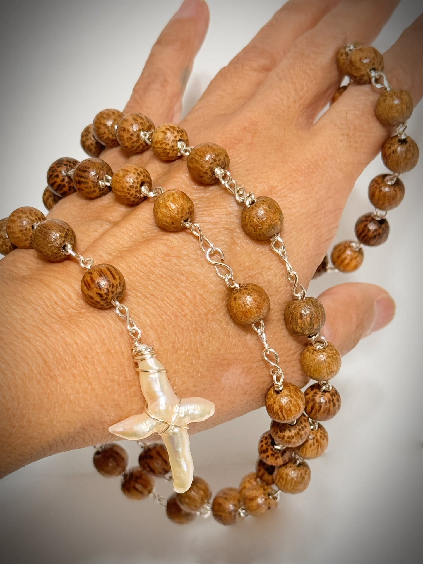 Mother of pearl white cross rosary like necklace tan wood bead