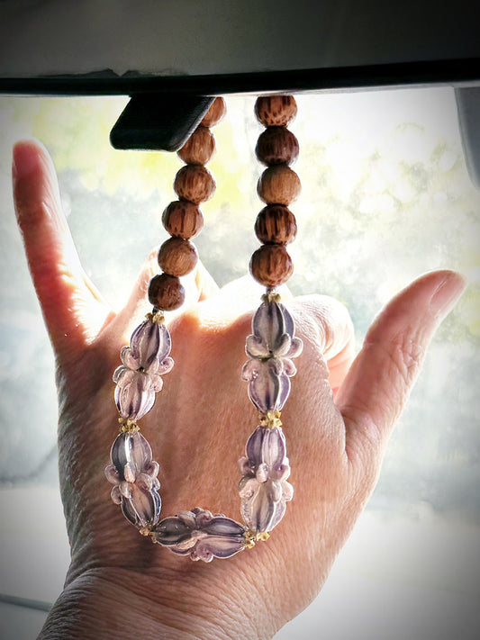 Pua Kalaunu purple car lei with silver spacers wood bead finish and hoop closer